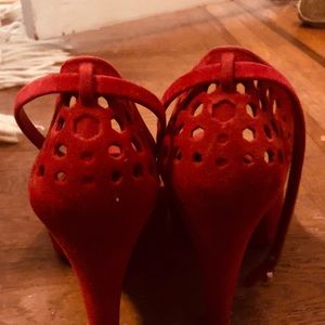 Brand new Melissa suede red heels with clasp!